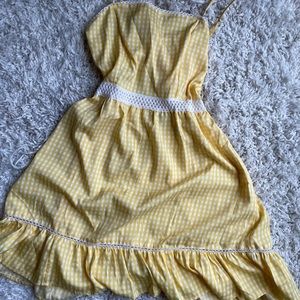 Yellow open back cut dress